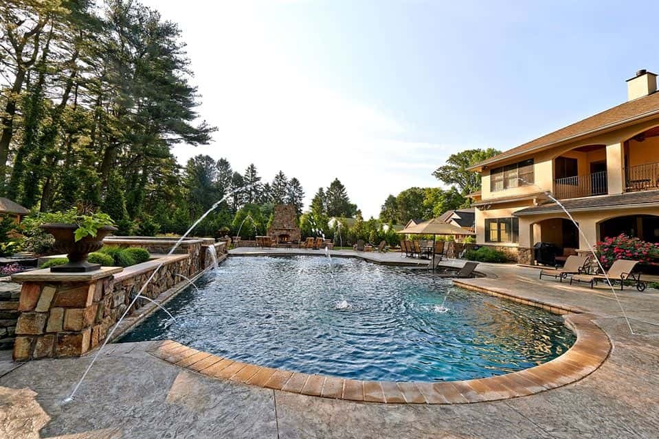 4) Outdoor pool with cascading waterfall