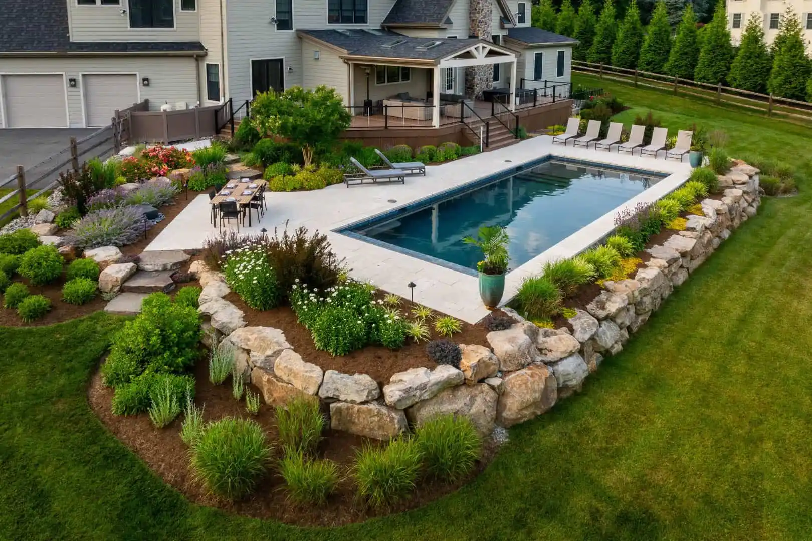 Landscaping and Hardscaping around a custom pool
